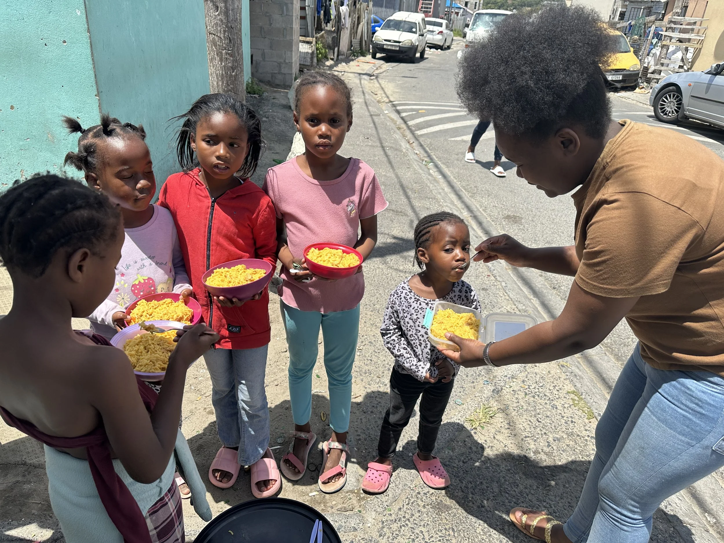 Feeding Children in Street.jpeg
