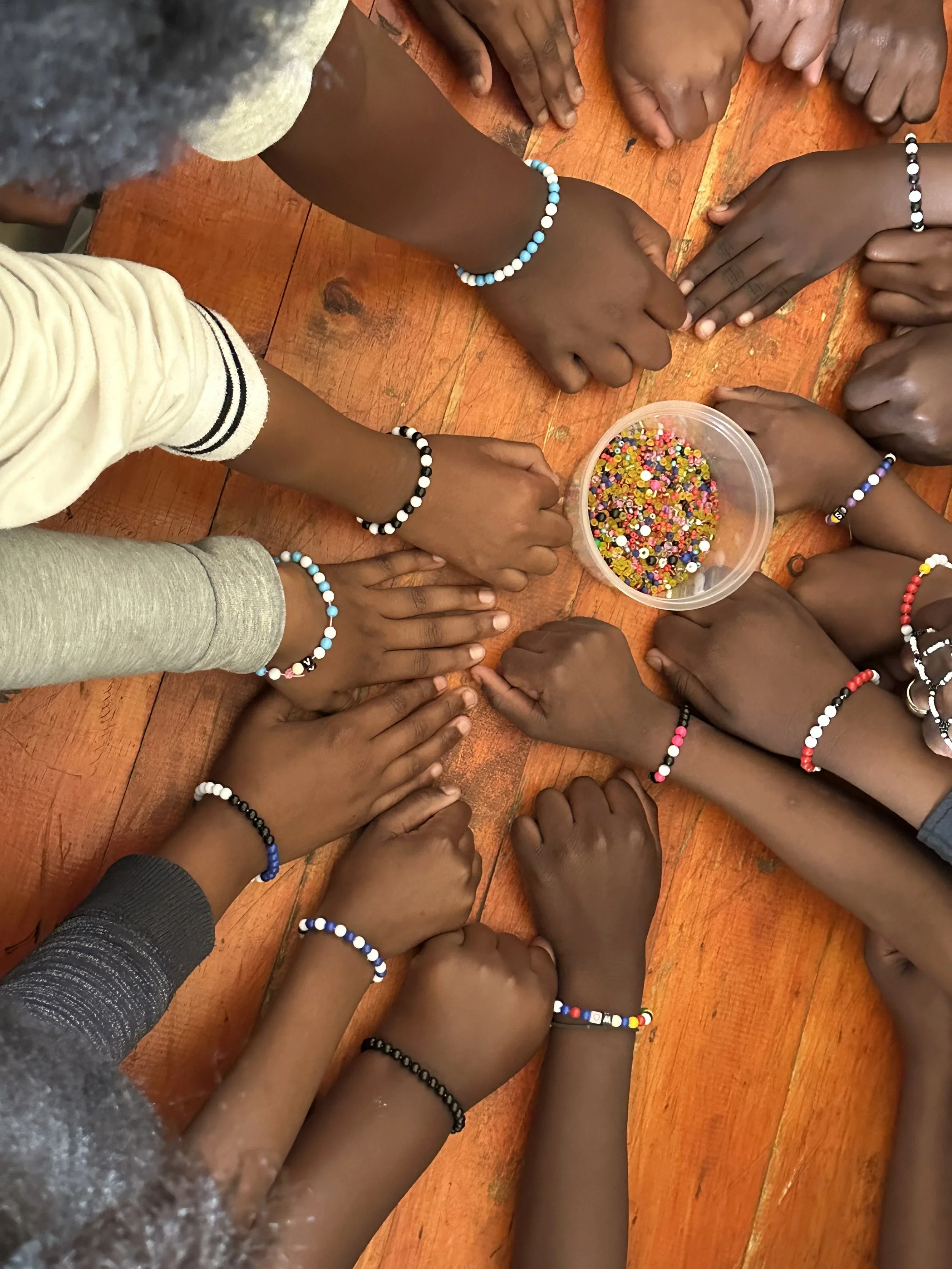 Hands with Beaded Bracelets.jpeg