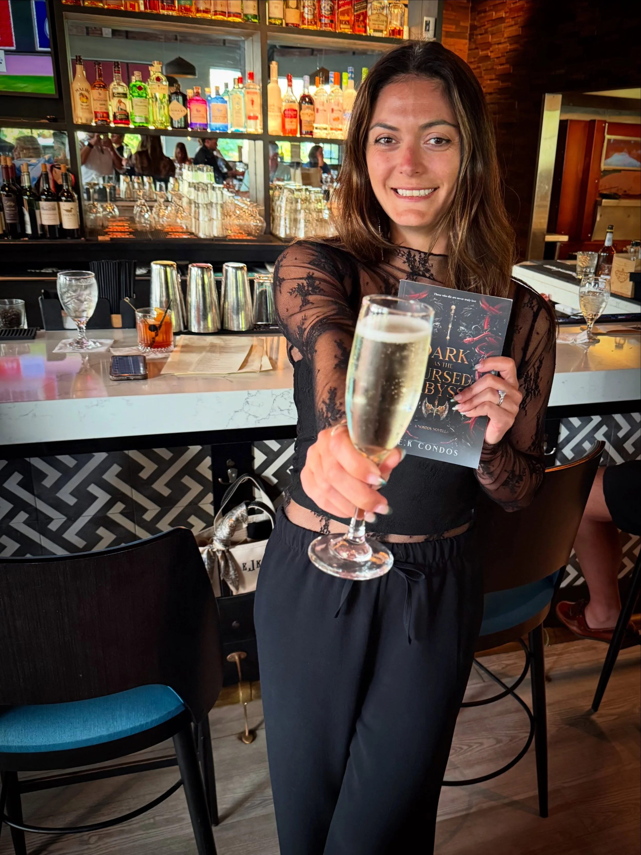 I have spent release day for each of my four books with Mr.EK at our favorite restaurant @albaon53 with a glass of champagne 🌊🏴&zwj;☠️🗡️(is it a tradition now?)

I can&rsquo;t believe this series is almost over, but I hope you all love returning t