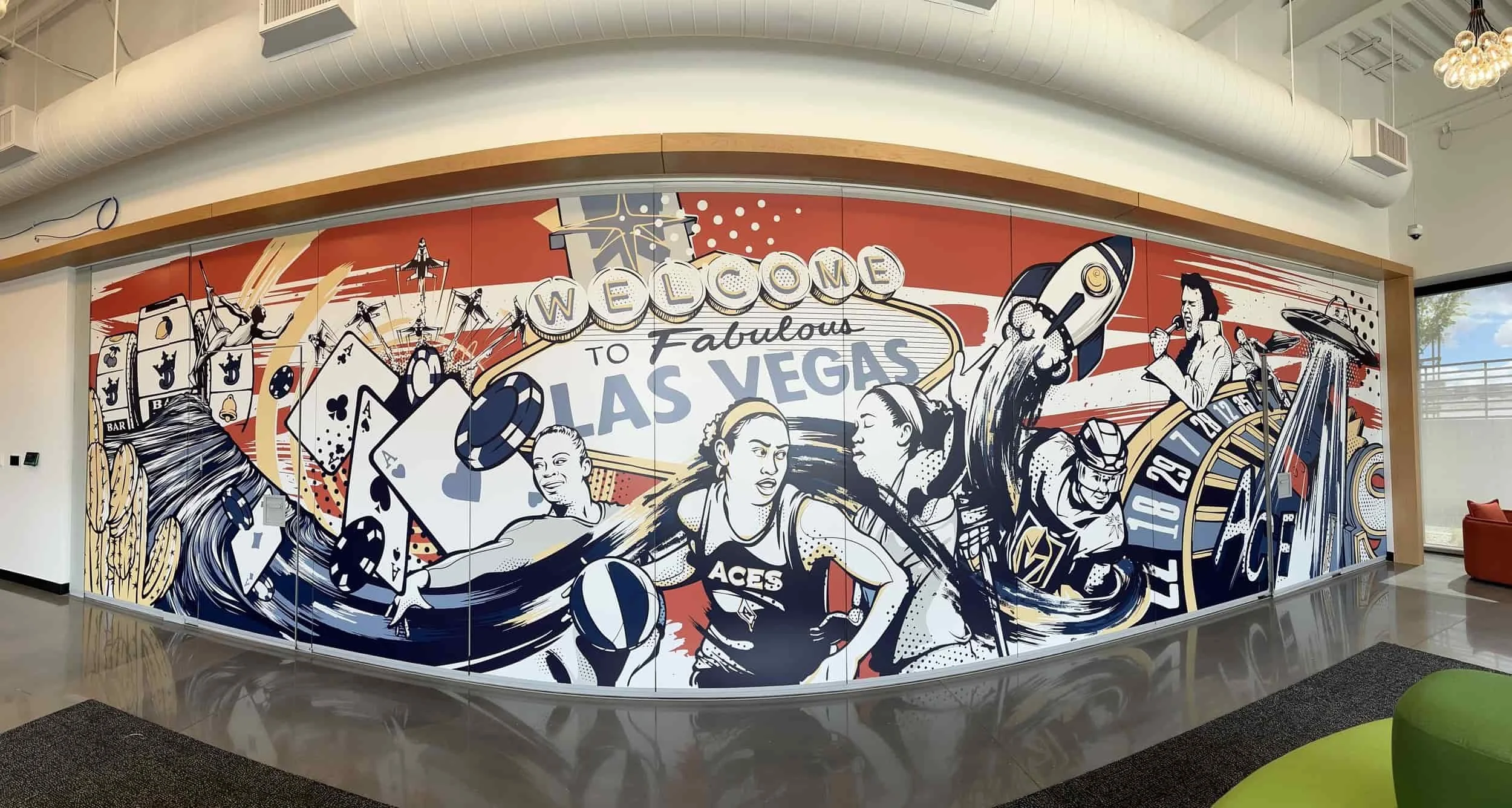 Mural showing Welcome to Fabulous Las Vegas with athletes, playing cards, and Vegas icons in bold, colorful comic style.