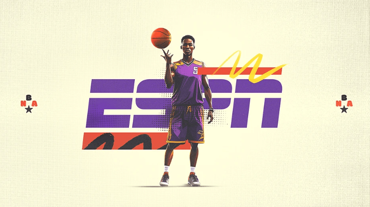 A basketball player in a purple uniform spins a ball on his finger in front of a large, stylized ESPN logo.