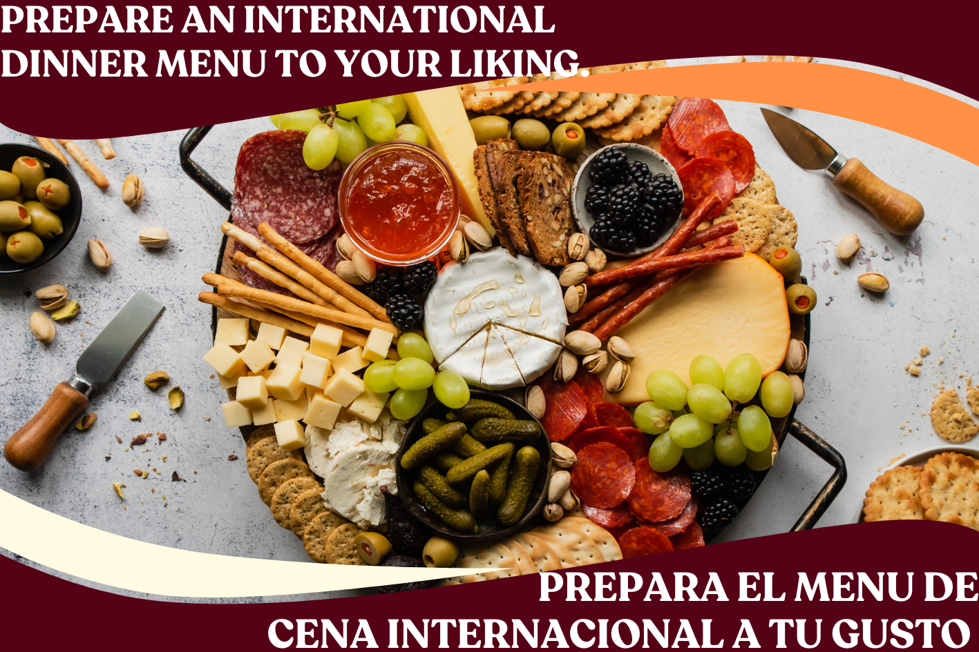 A cheese and charcuterie platter with grapes, crackers, bread, cured meats, cheeses, olives, and spreads on a tray, with some scattered around.