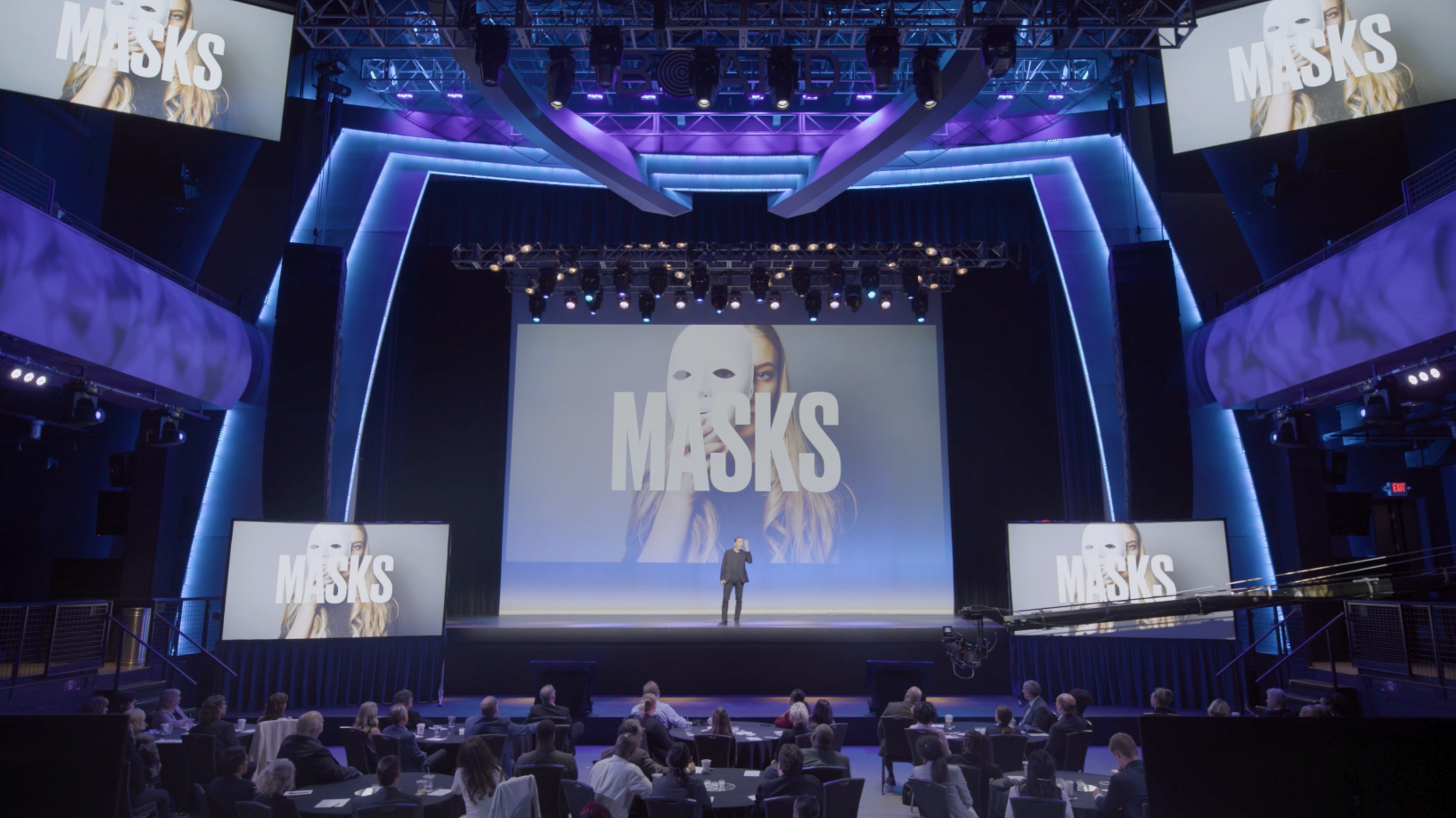 Frankie Russo Keynote Speaker Authenticity Masks Stage shot 1.png