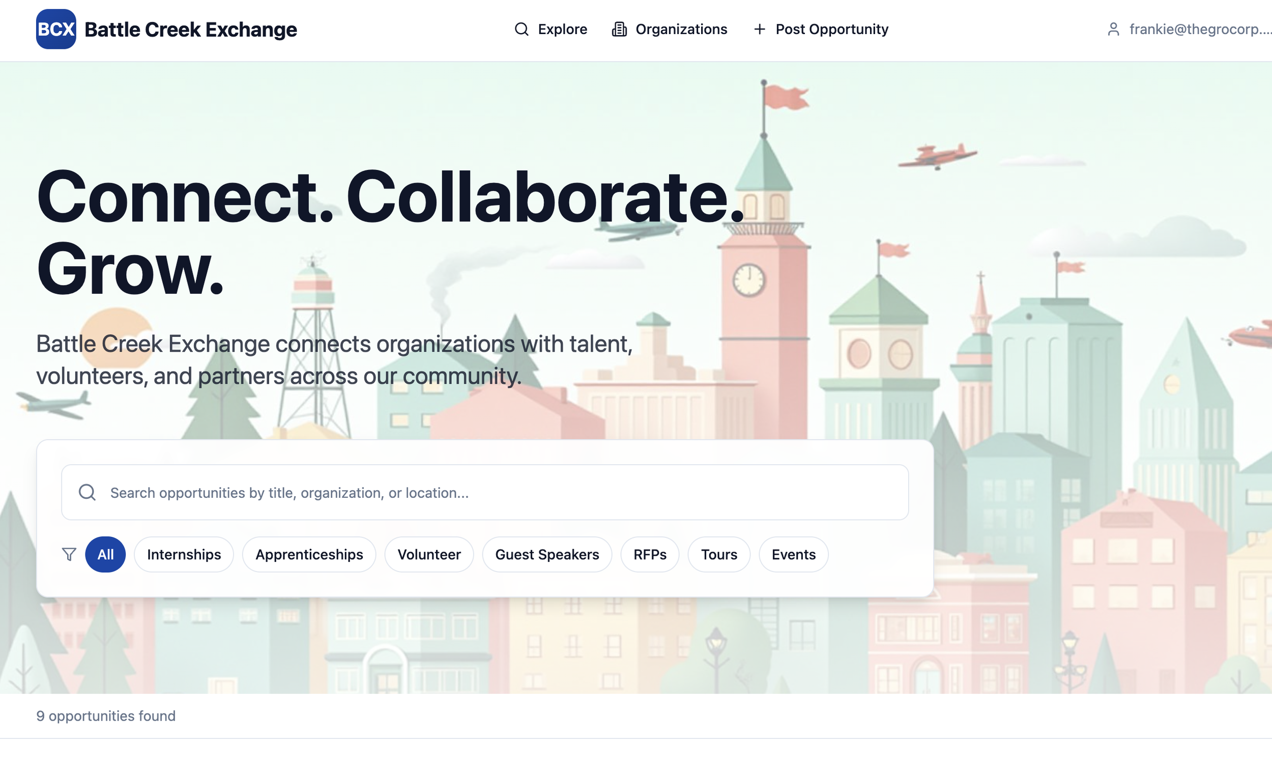 Battle Creek Exchange - home page showing a man in a suit using a tablet outside in front of a modern house, with a dark blue background and navigation options.