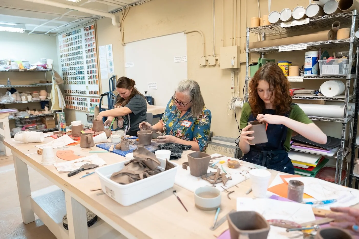 Students creating handbuilt mugs