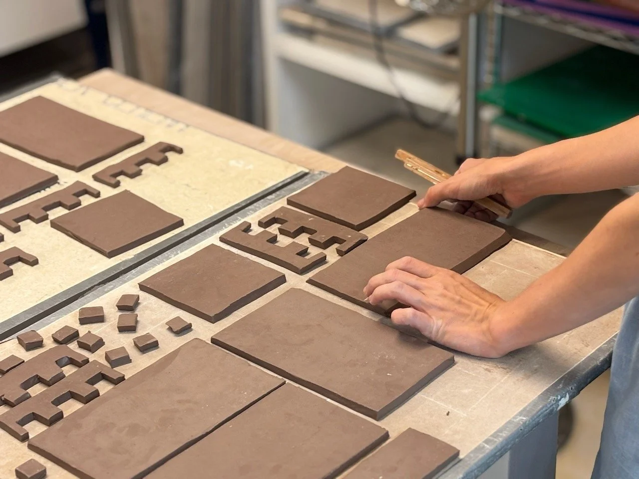 Clay slabs prepared in a handbuilding workshop