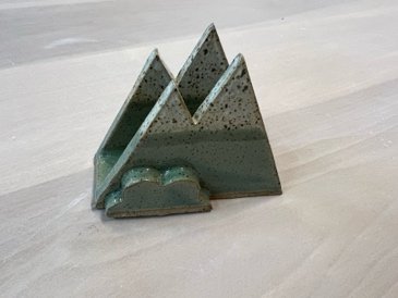 A small ceramic object on a table.jpg