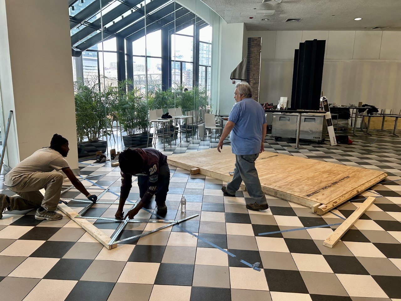 Revolution Workshop constructing the museum's exhibit walls. 