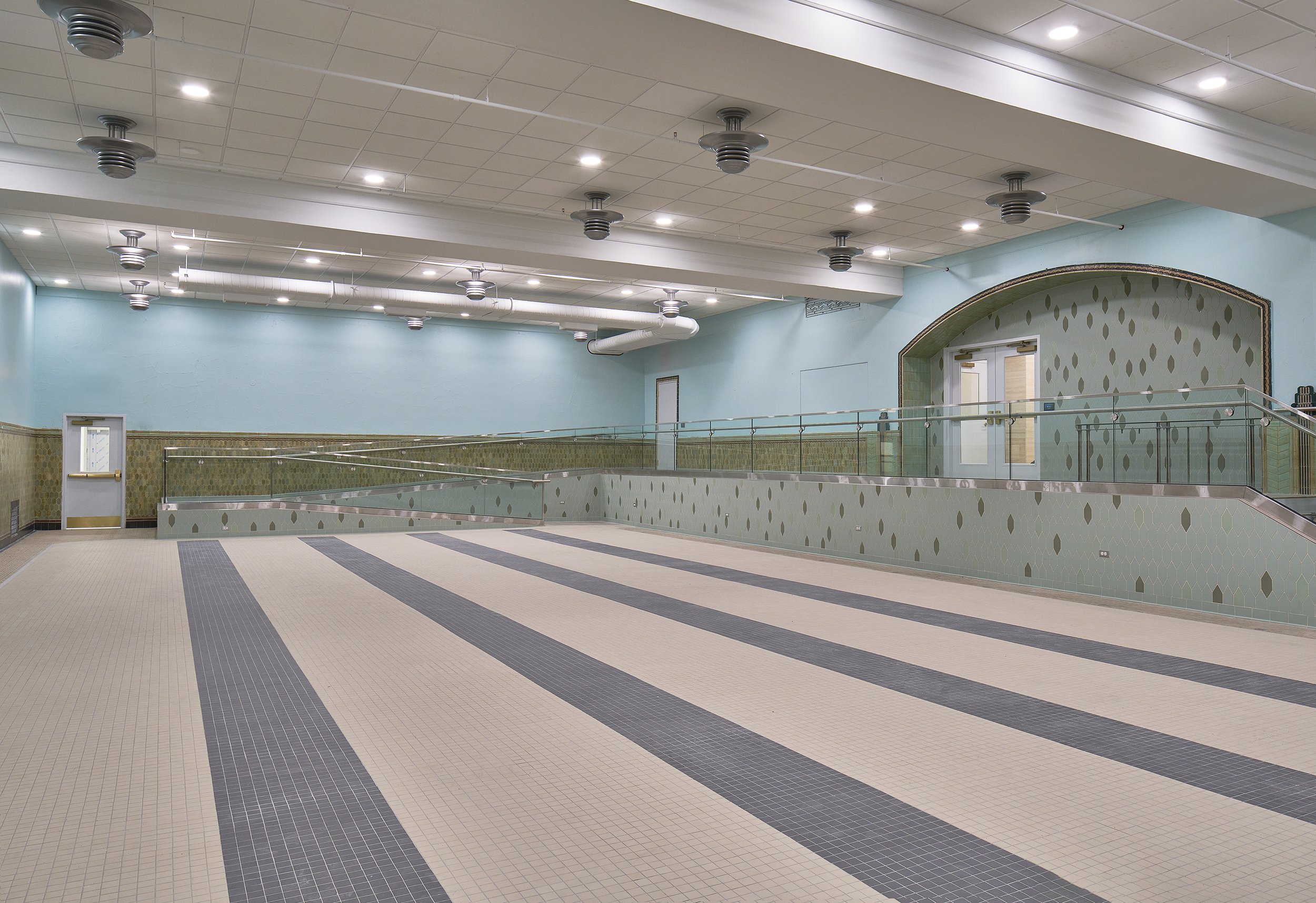 Salvaged and Reimagined Event Hall: The project infilled the pool for safety reasons, but the design allows for a completed reversal of the process to bring the pool back at any time.