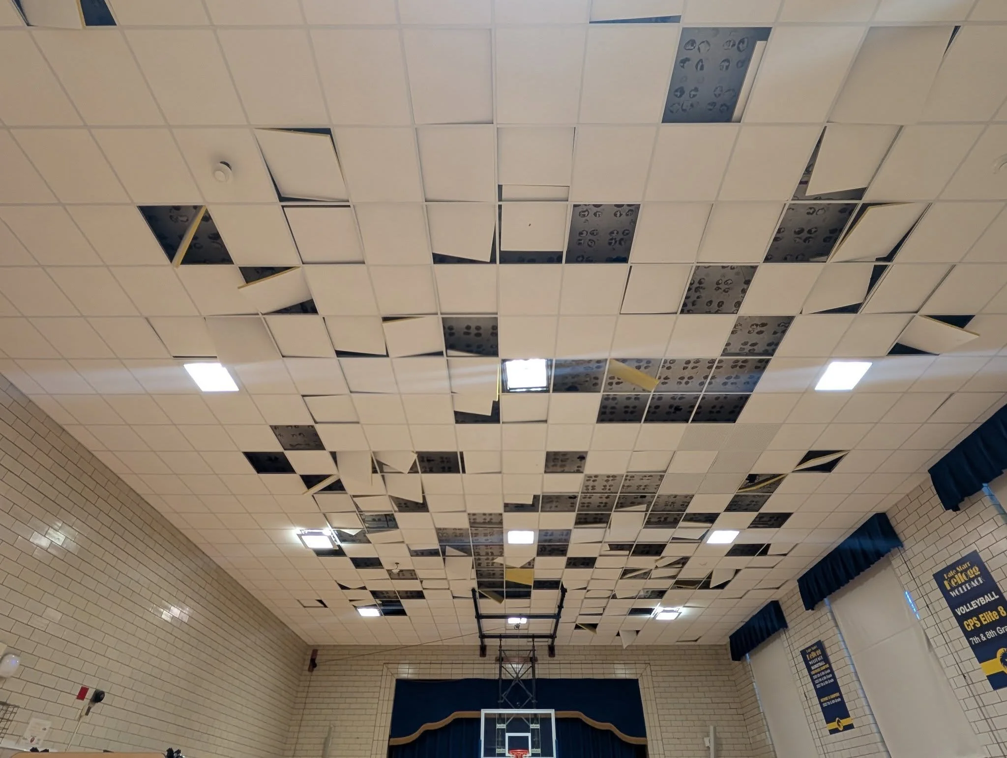 Before: The drop-ceiling tiles were falling and creating a life safety hazard.