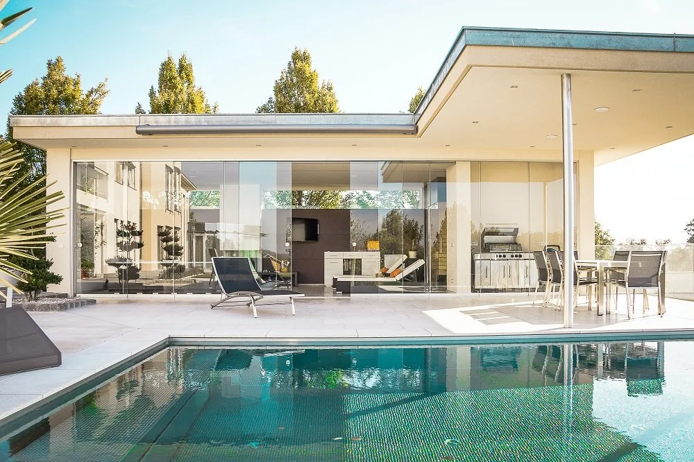 A Central Phoenix house with a swimming pool in front of it.