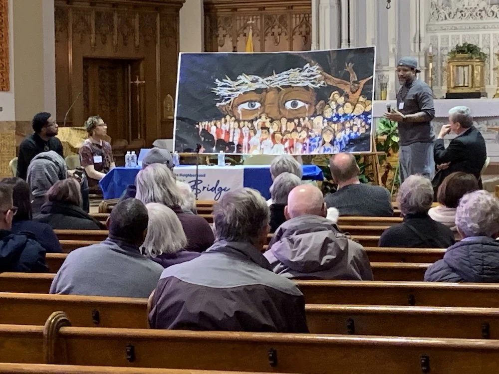 Haman Cross III discusses his painting, “Unrequited Love.”