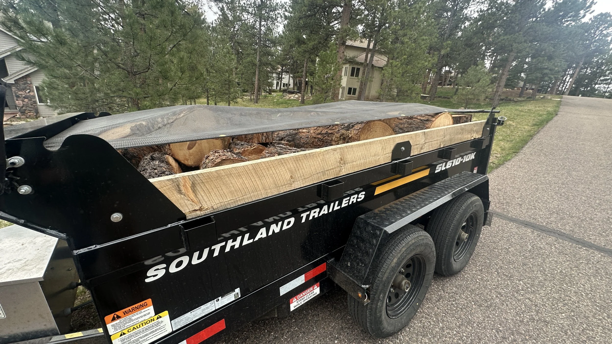 Our dump trailer. Yes, we also provide junk removal services!