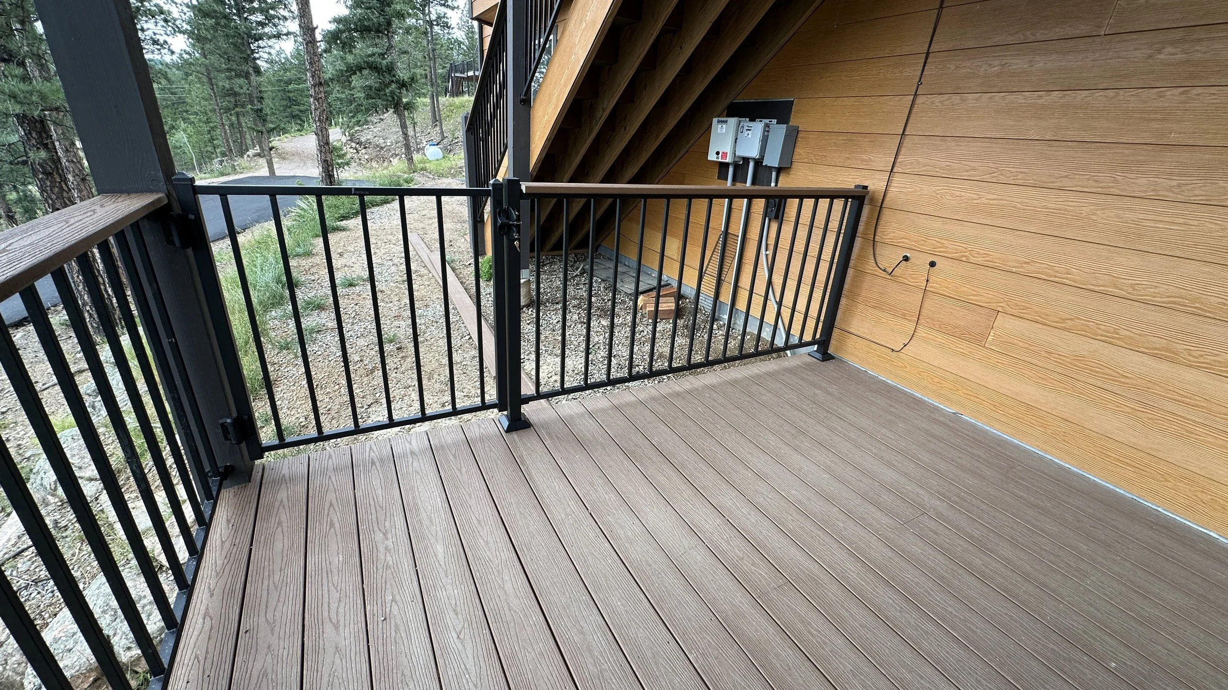 After: Fortress Fencing install with gate.