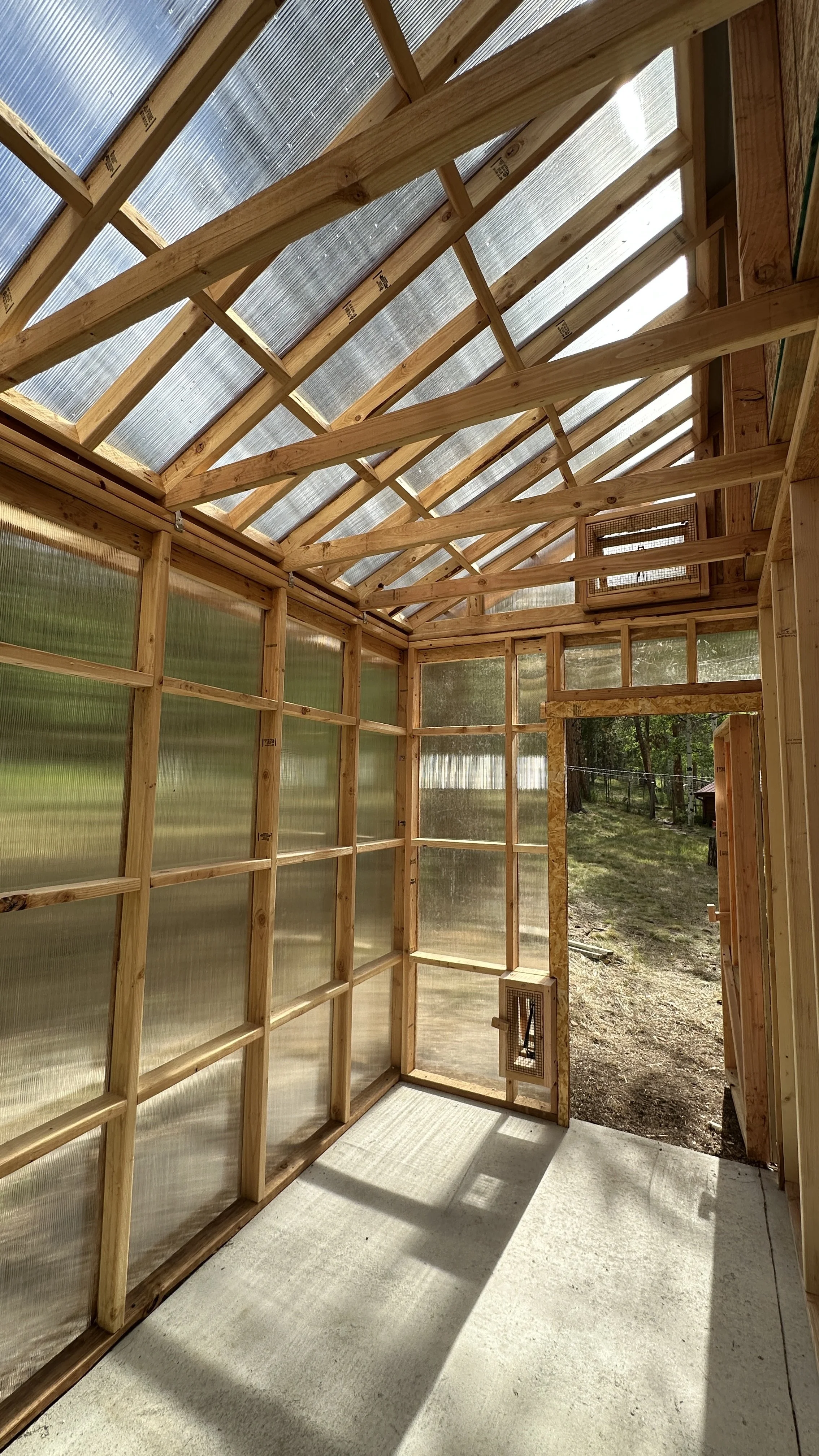Custom 12x12 Greenhouse/shed build. Lots of bracing to add strength for polycarbonate glazing.