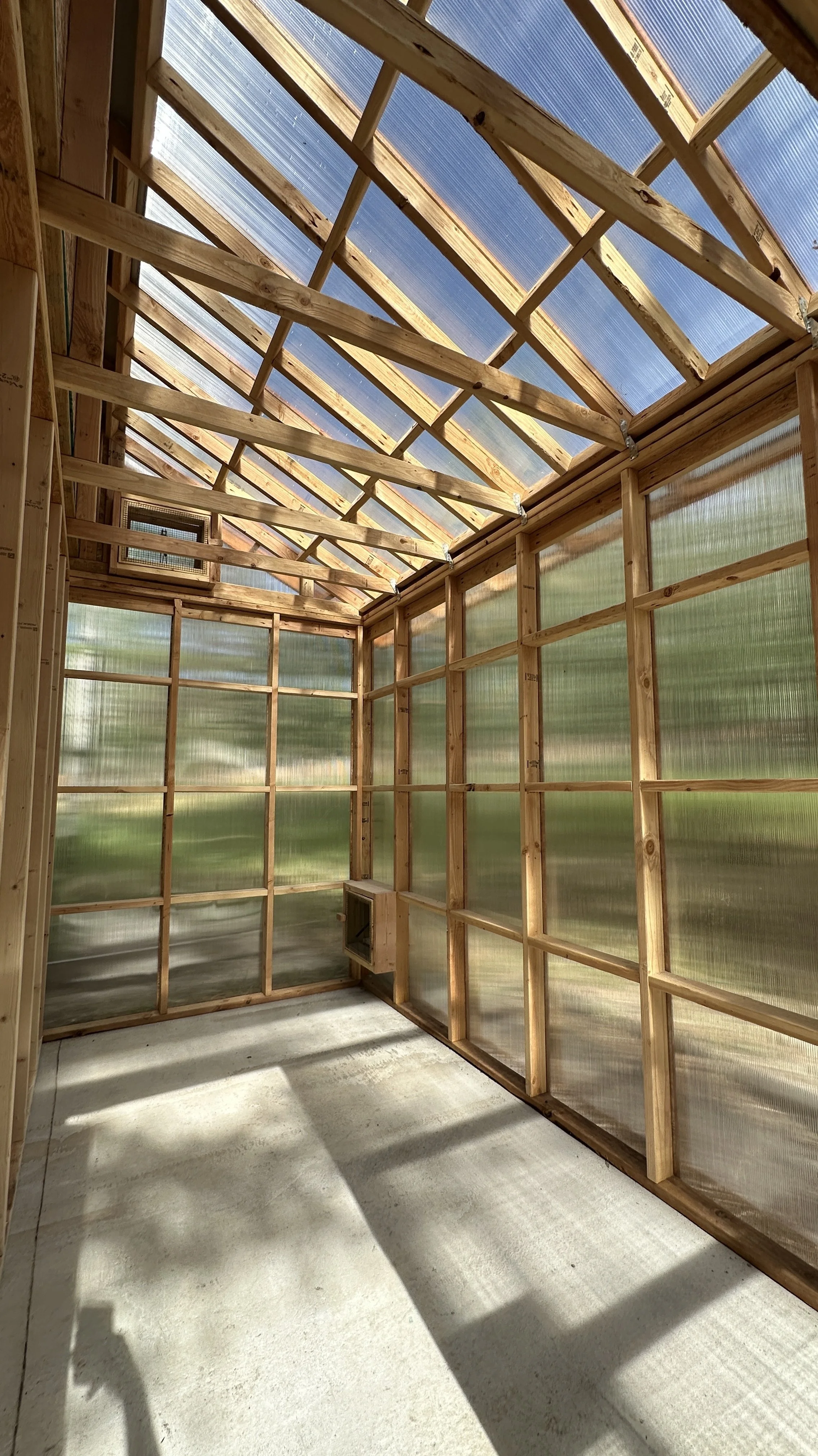 Custom 12x12 Greenhouse/shed build. Lots of bracing to add strength for polycarbonate glazing.