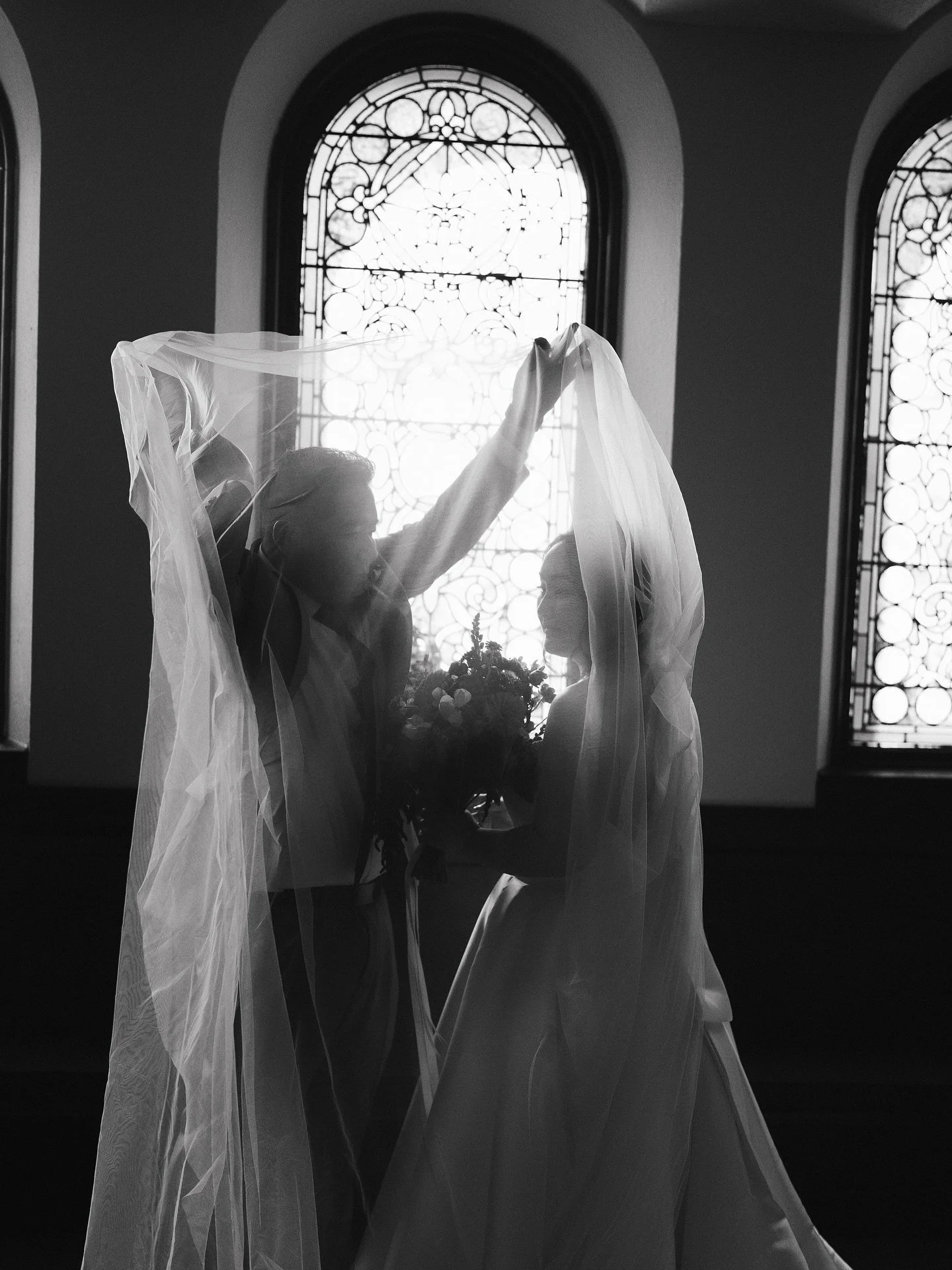 A cinematic frame from the in-between moments &mdash; soft light, a quiet vow, and everything unsaid

Florist @fleurshop.quincy 
MUA： @makeup_by_minah 

#bostonweddingphotographer #bostonwedding #bostonbride #cinematicphotography