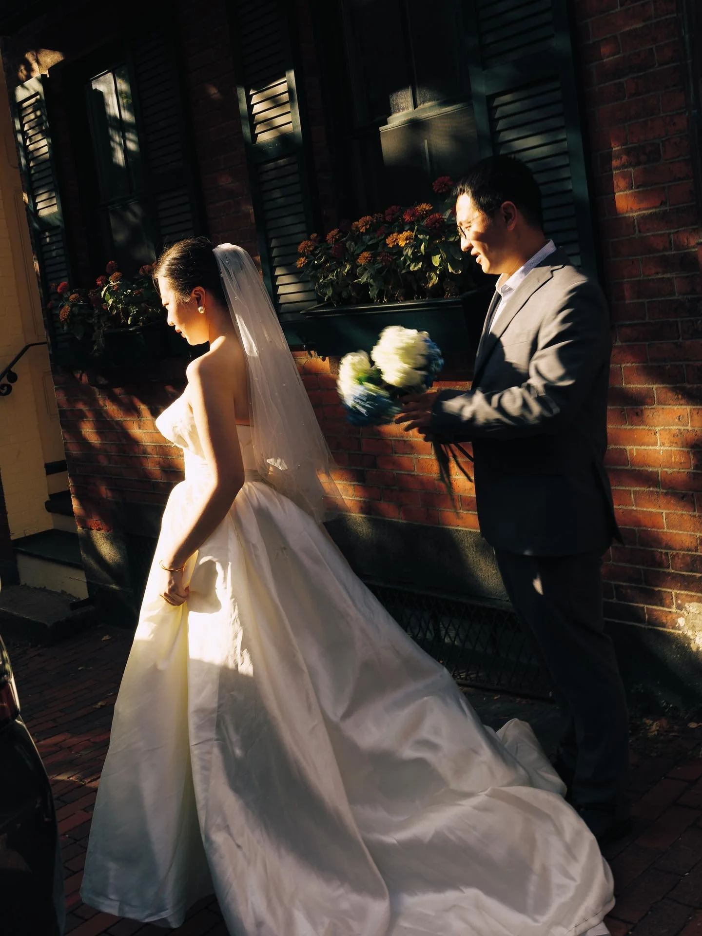 Love, painted in light. ✨ J + G wandering through Beacon Hill &mdash; where every corner tells a story.

#BeaconHill #BostonWedding #FallInLove