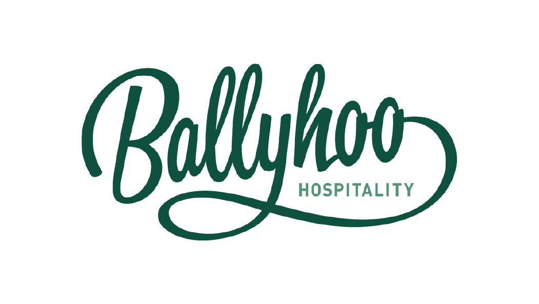 Logo of Ballyhoo Hospitality with stylized cursive text and a curved underline.