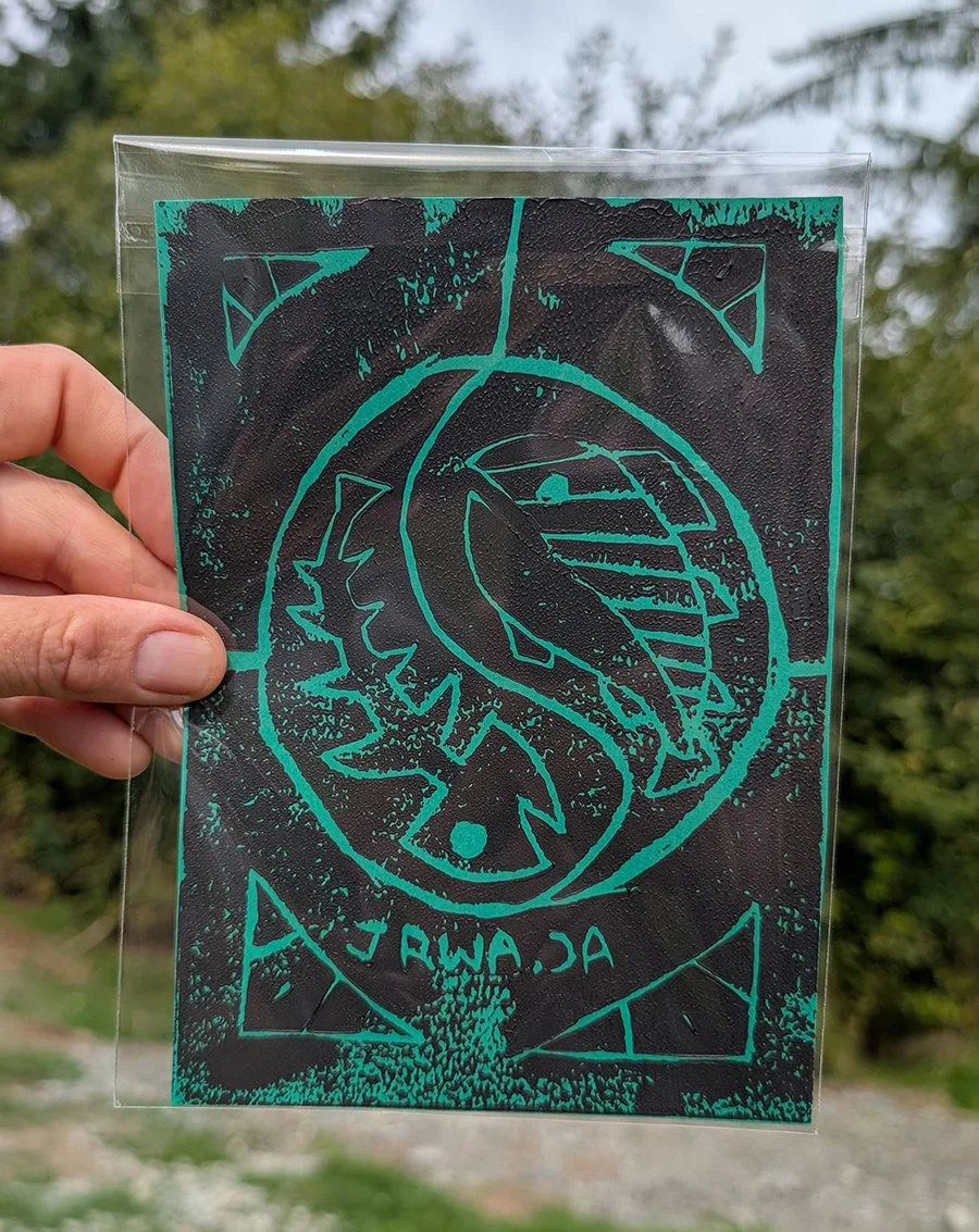 Student artwork, teal linework in a yin yang symbol with a fish skeleton and a healthy fish
