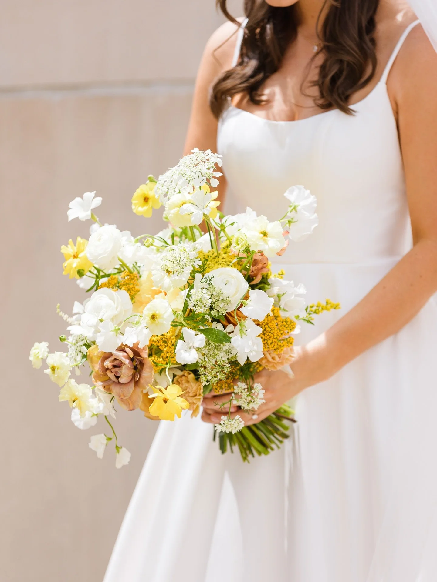 A soft spring palette of ivory, champagne, and pale yellow for Mackenzie 🤍🌼