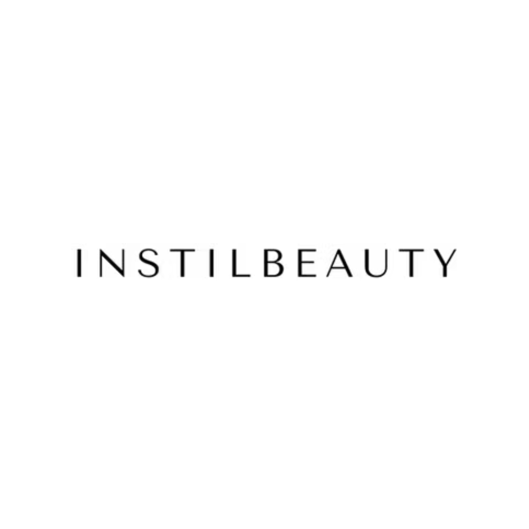 Text logo that says "in skin & brows" in soft pink and black cursive font on a white background.