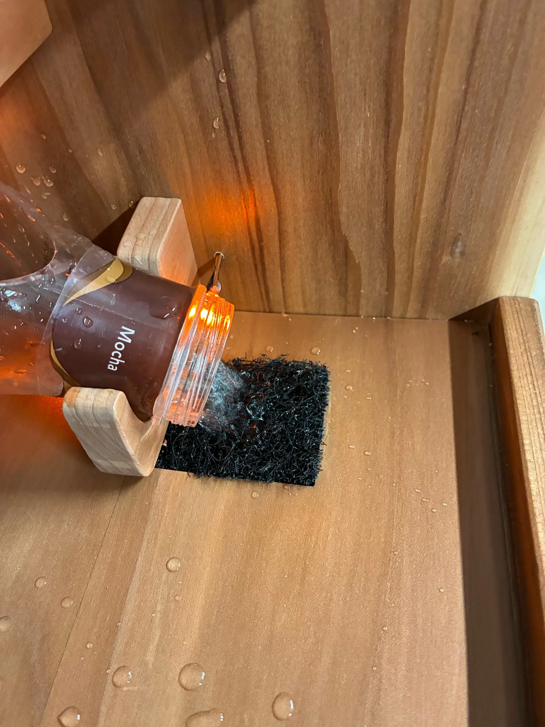 Featuring four Starbucks Frappuccino  bottles arranged in a cascading tabletop waterfall design