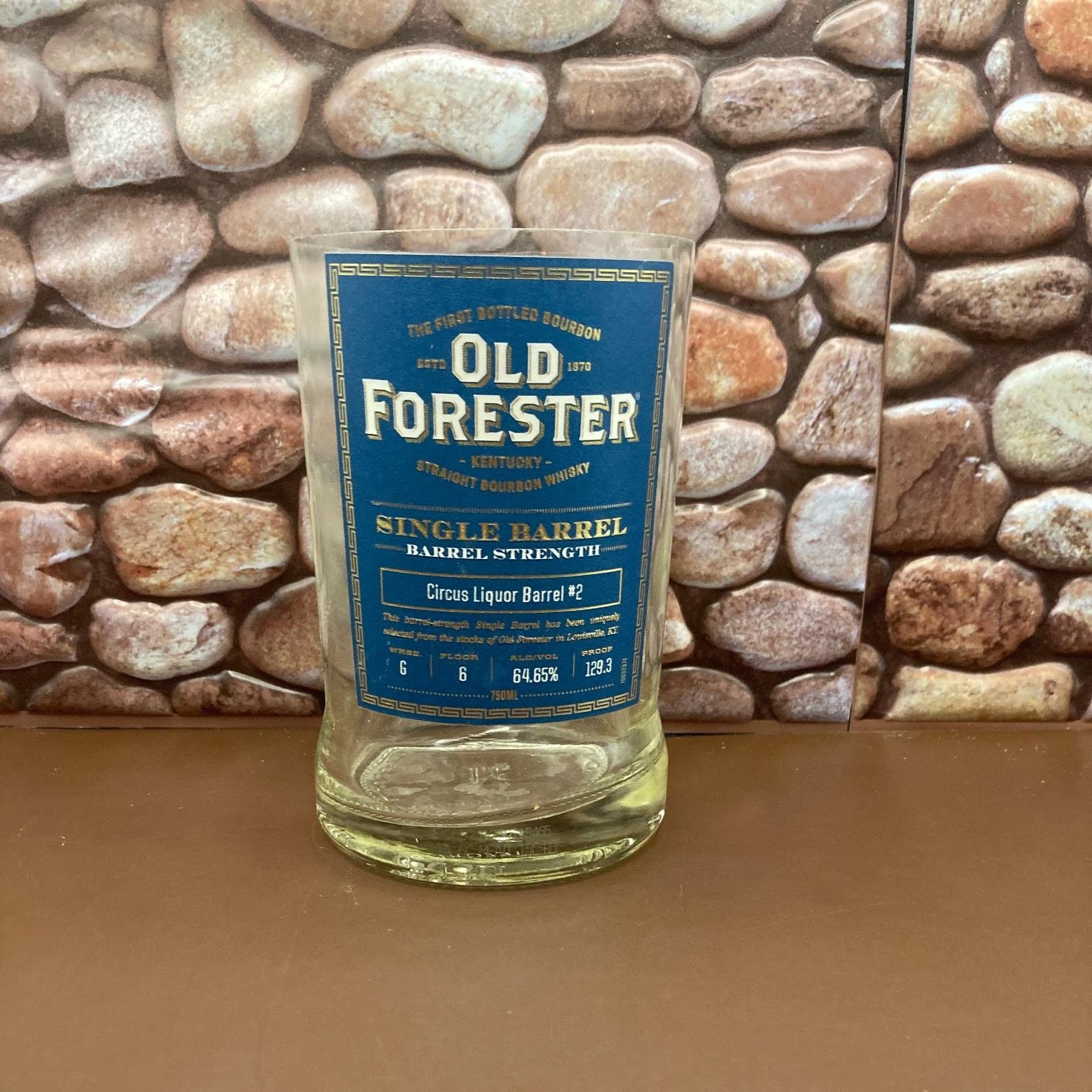 Old Forester Blue Label Bourbon Upcycled Candle. Makes a great gift. Unique candle holder. The Palm Tree wax gives it a distinct look the wood wick makes it crackle. Natural fragrance oils.