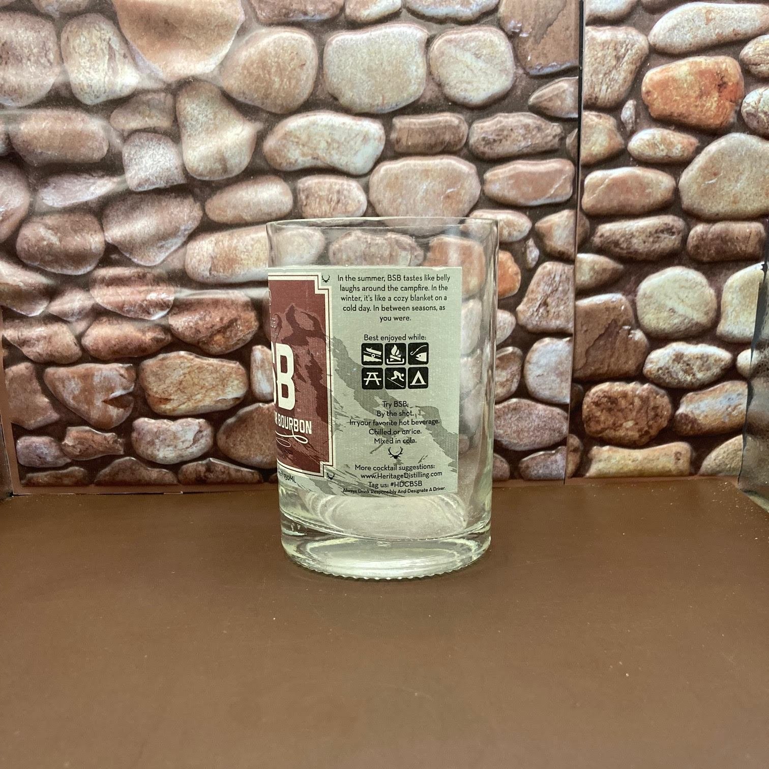 Brown Sugar Bourbon Upcycled Bottle Candle. Makes a Unique candle. The Palm Tree wax gives it a distinct look the wood wick makes it crackle. Natural fragrance oils.