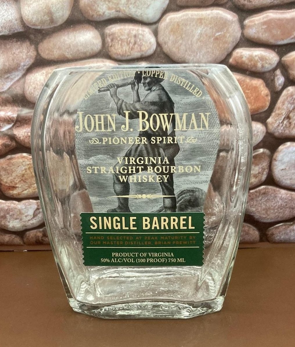 John J. Bowman Upcycled Single Barrel Bottle Candle. The Palm Tree wax gives it a distinct look, comes with a wood wick. Natural fragrance oils.