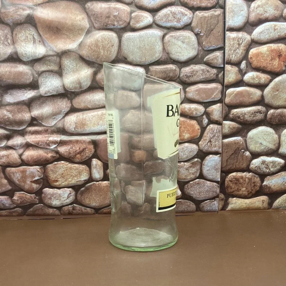 Bacardi Upcycled Gold Bottle Candle Holder. The Palm Tree wax gives it a distinct look the wood wick makes it crackle. Natural fragrance oils.