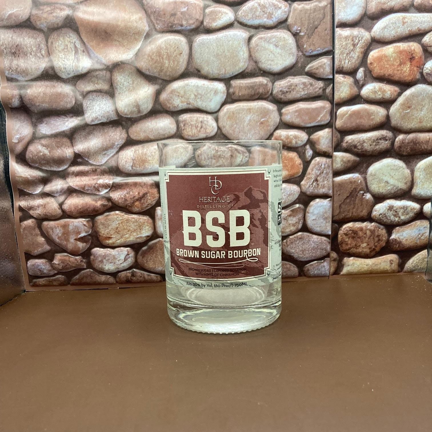 Brown Sugar Bourbon Upcycled Bottle Candle. Makes a Unique candle. The Palm Tree wax gives it a distinct look the wood wick makes it crackle. Natural fragrance oils.
