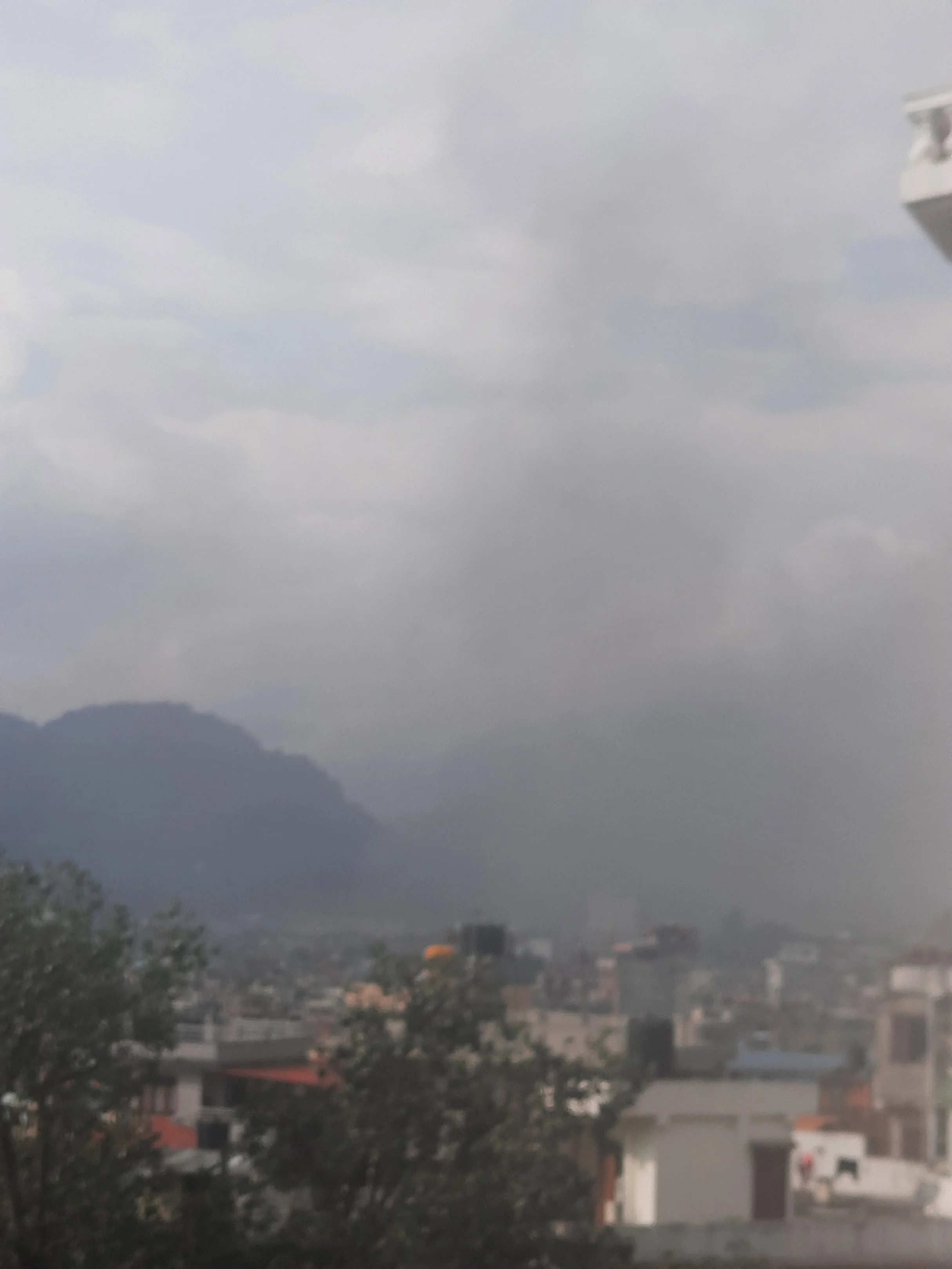 Watching the smoke rise - from our rooftop vantage point