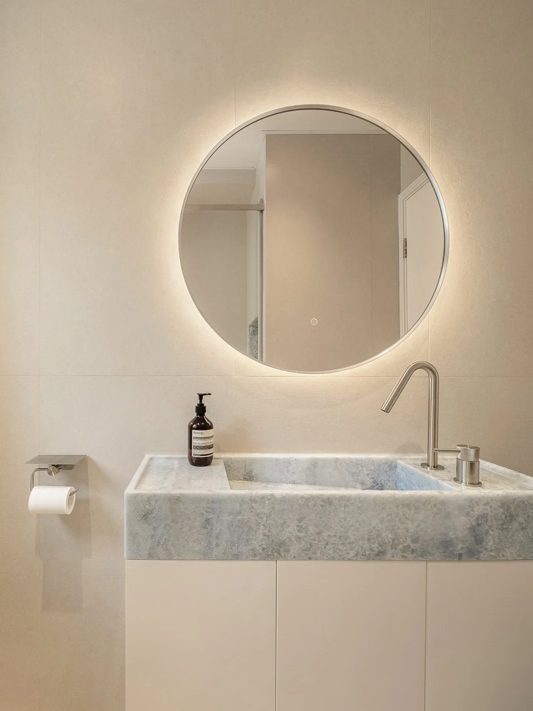 Wrapped in soft beige tiles and featuring a thoughtful selection of Blue Celeste marble, this bathroom creates a celebration of perfect balance &mdash; where warmth meets coolness.
Its surfaces shift subtly with the light, transitioning from the gent