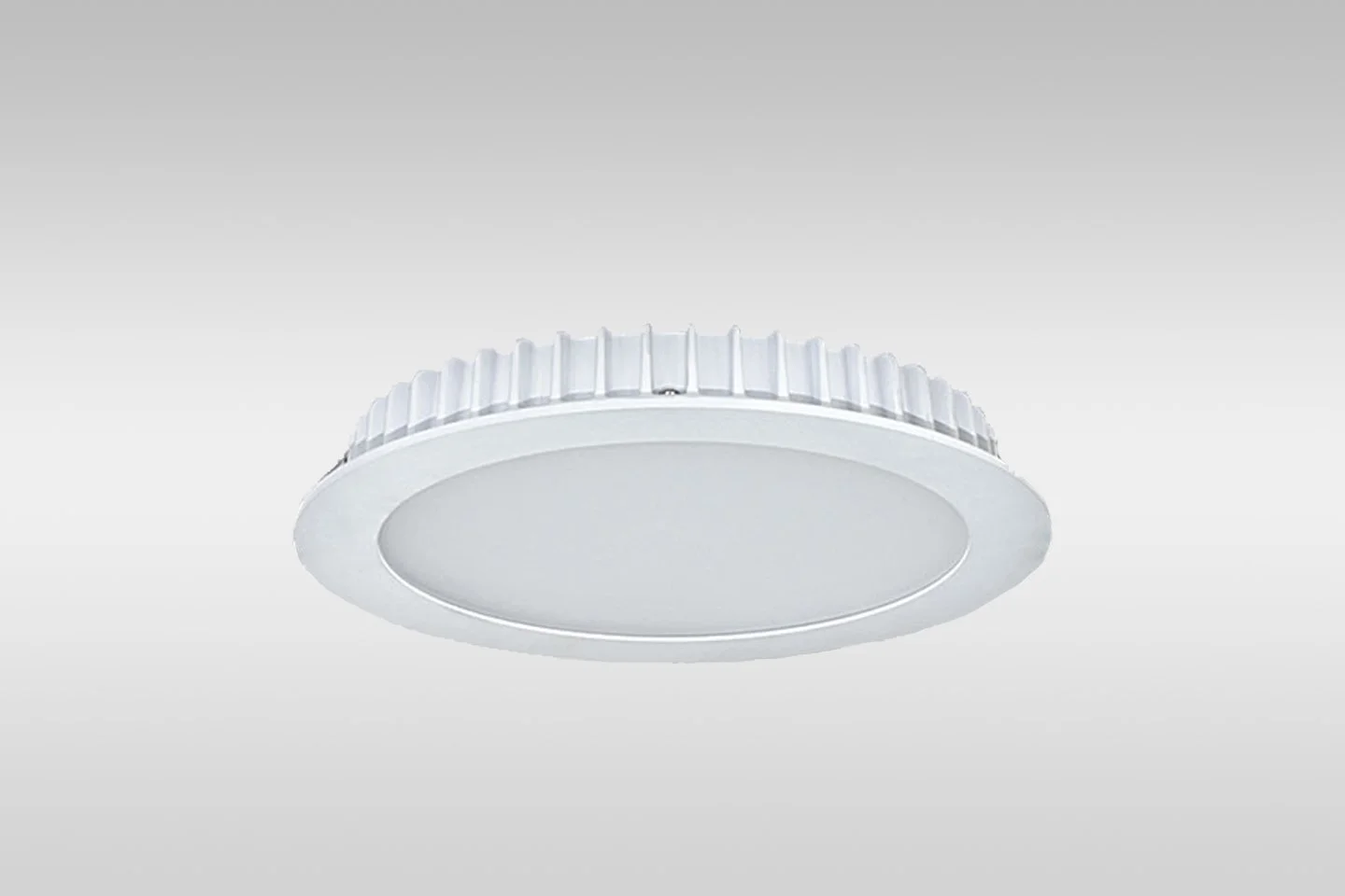 White circular LED ceiling light fixture with a ribbed outer edge.