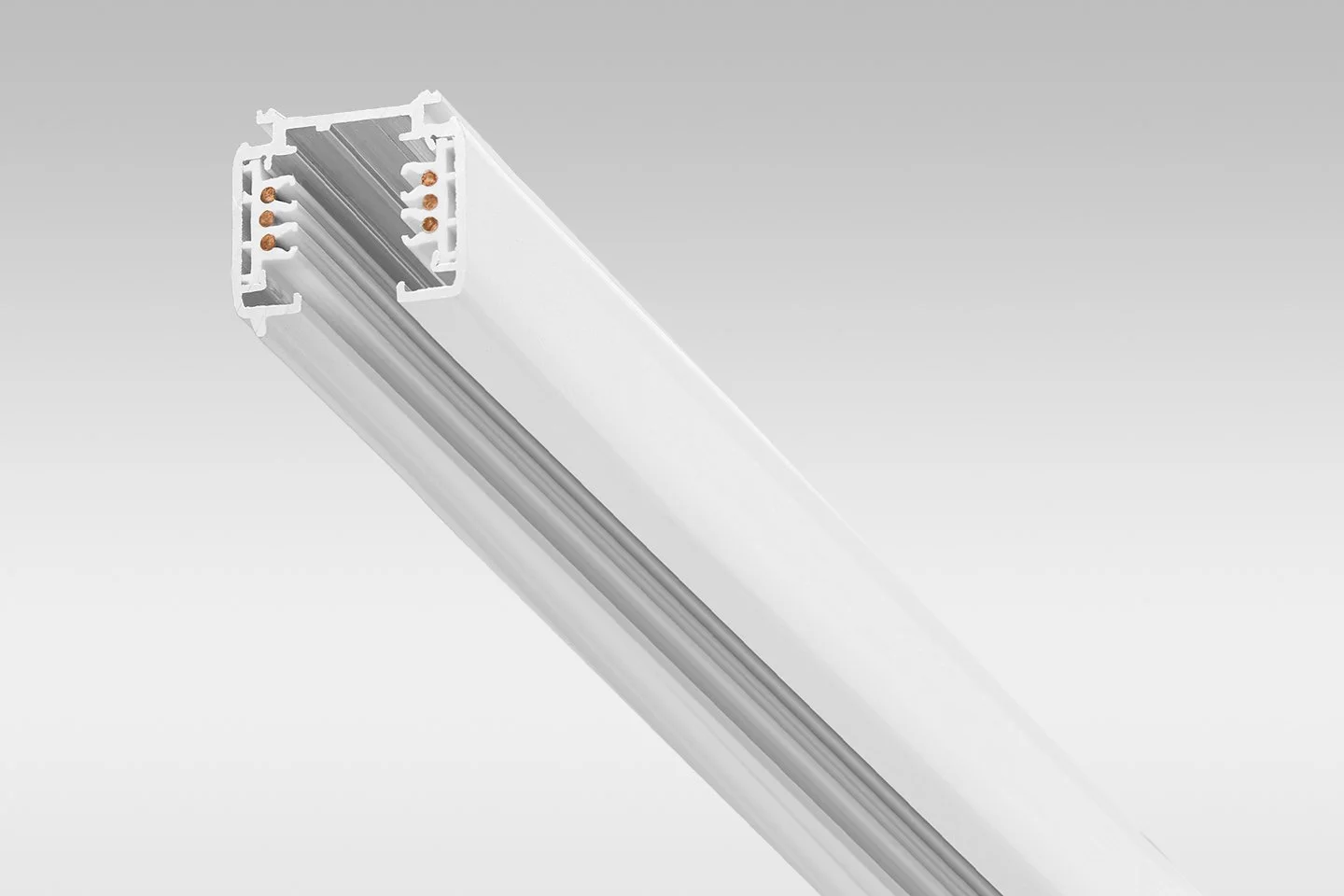 Close-up of a white LED linear light fixture with internal wiring visible.