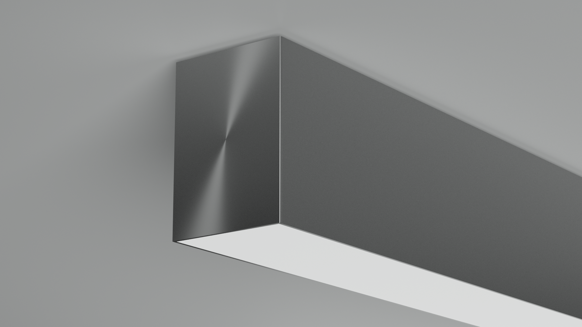 Close-up photo of a rectangular, modern, black and white ceiling light fixture mounted on a gray ceiling.