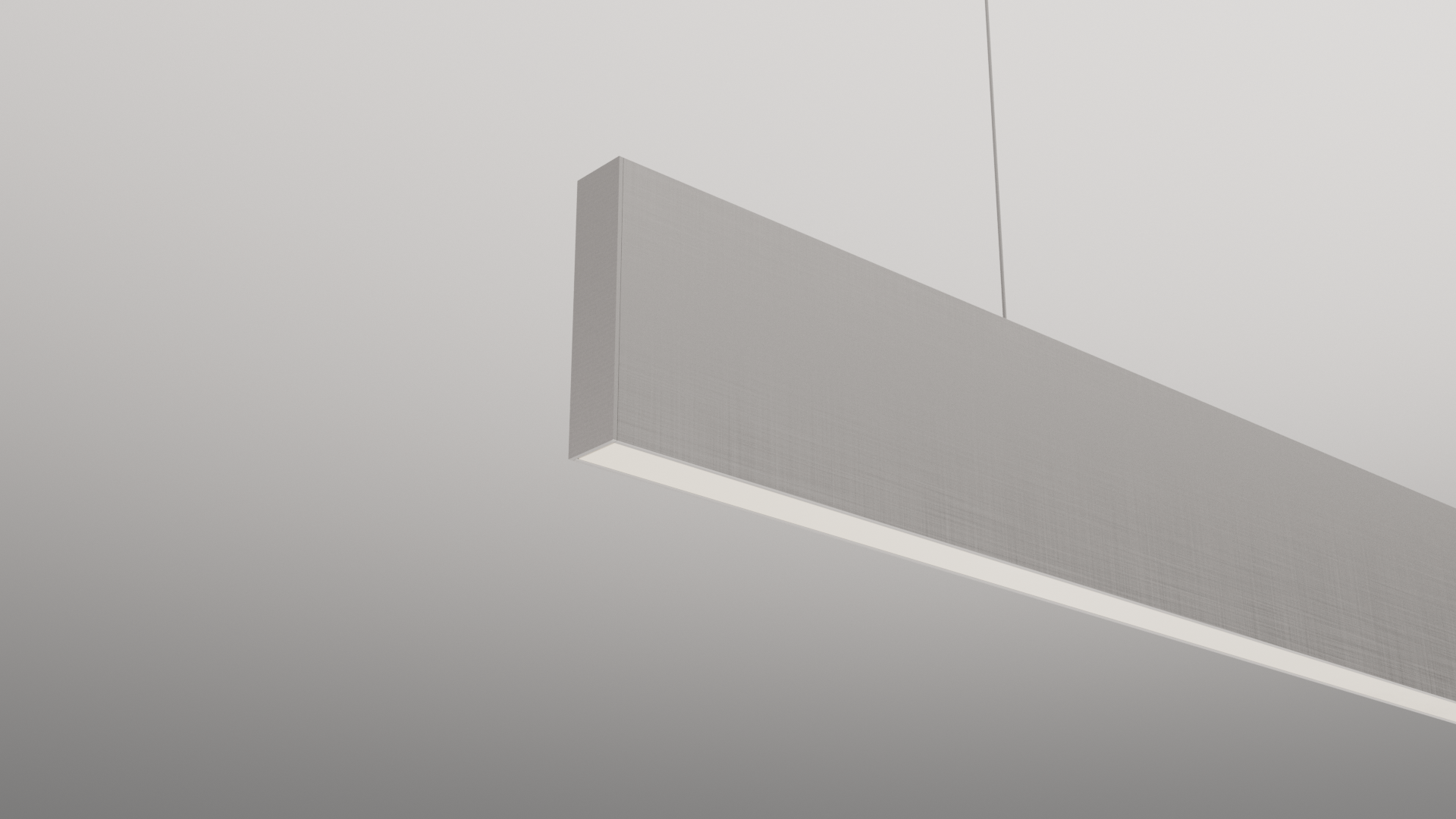 A modern, rectangular white hanging light fixture suspended from the ceiling by thin wires, against a plain white ceiling background.