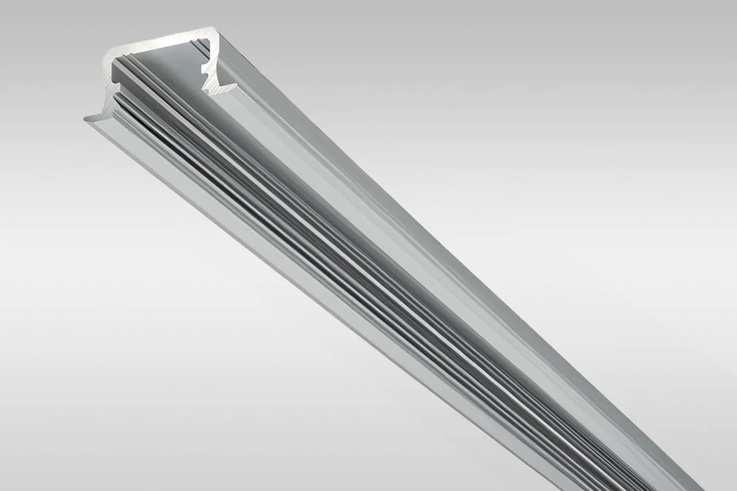 A metallic ceiling or wall-mounted linear air conditioning or ventilation duct