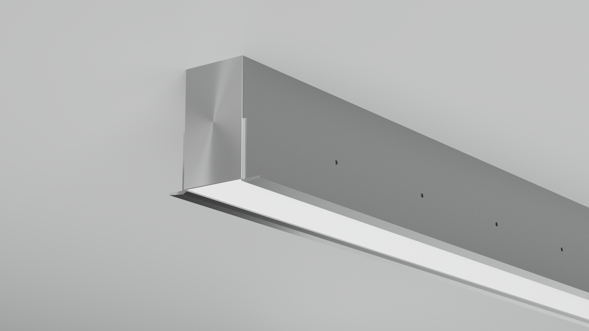 Close-up of a modern, rectangular LED ceiling light fixture with a metallic frame and a frosted white diffuser, mounted flush to a plain white ceiling.