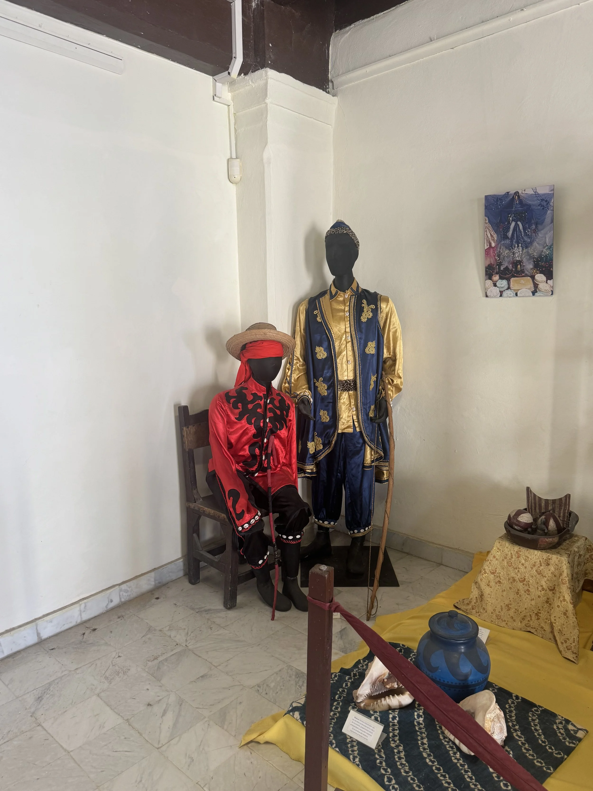  Eleguá and Ochosi Costumes in the Museum Casa de África, Havanna, Cuba 