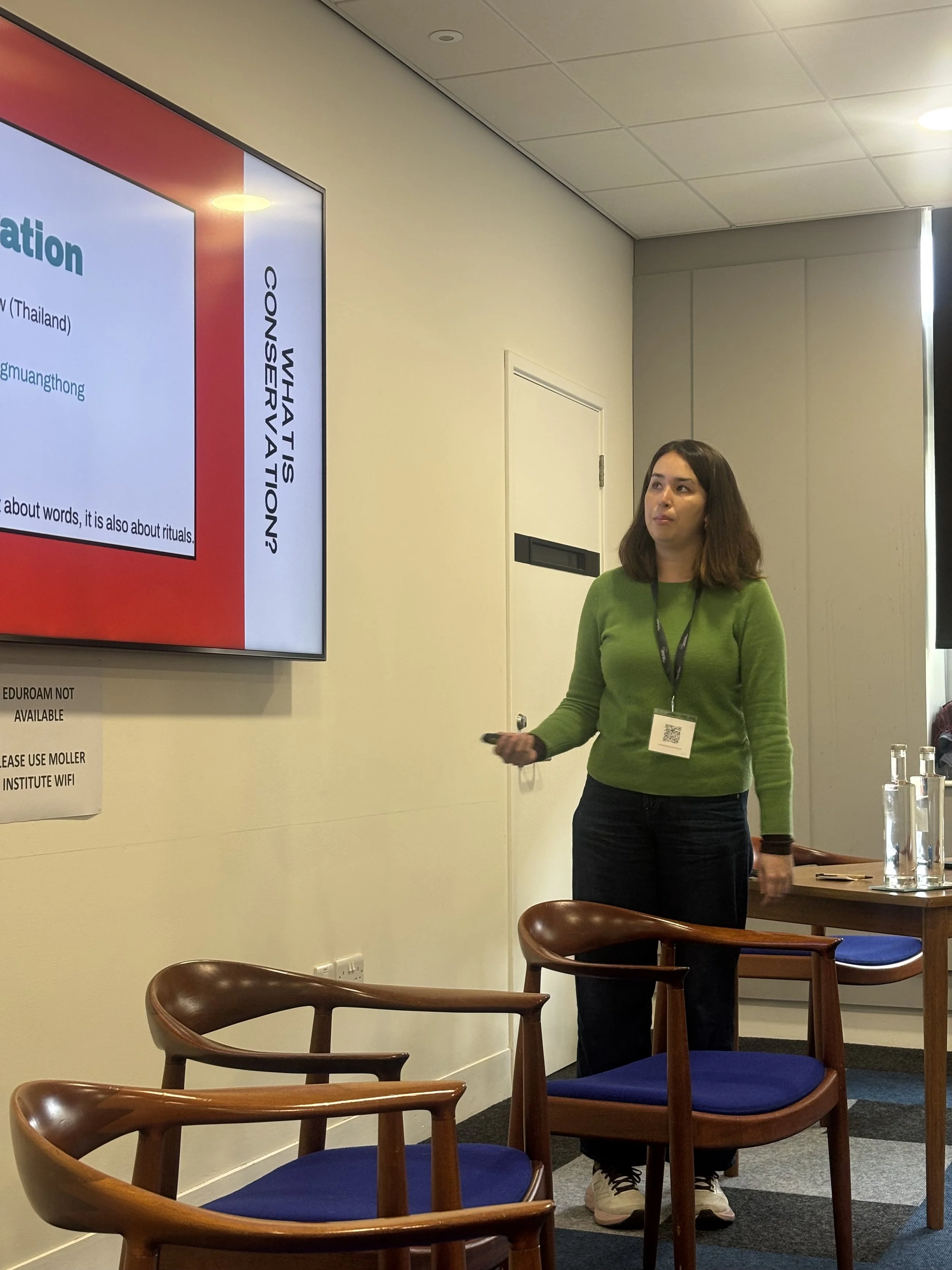 Alisa Santikarn presenting on the  Saan Boo Da shrine in Northeast Thailand