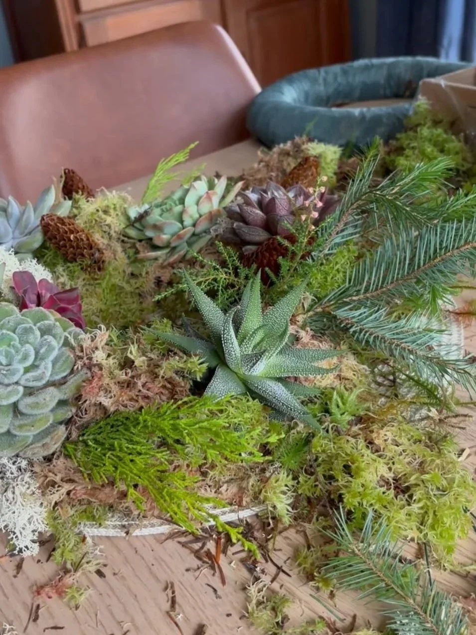 Succulent wreath behind the scenes