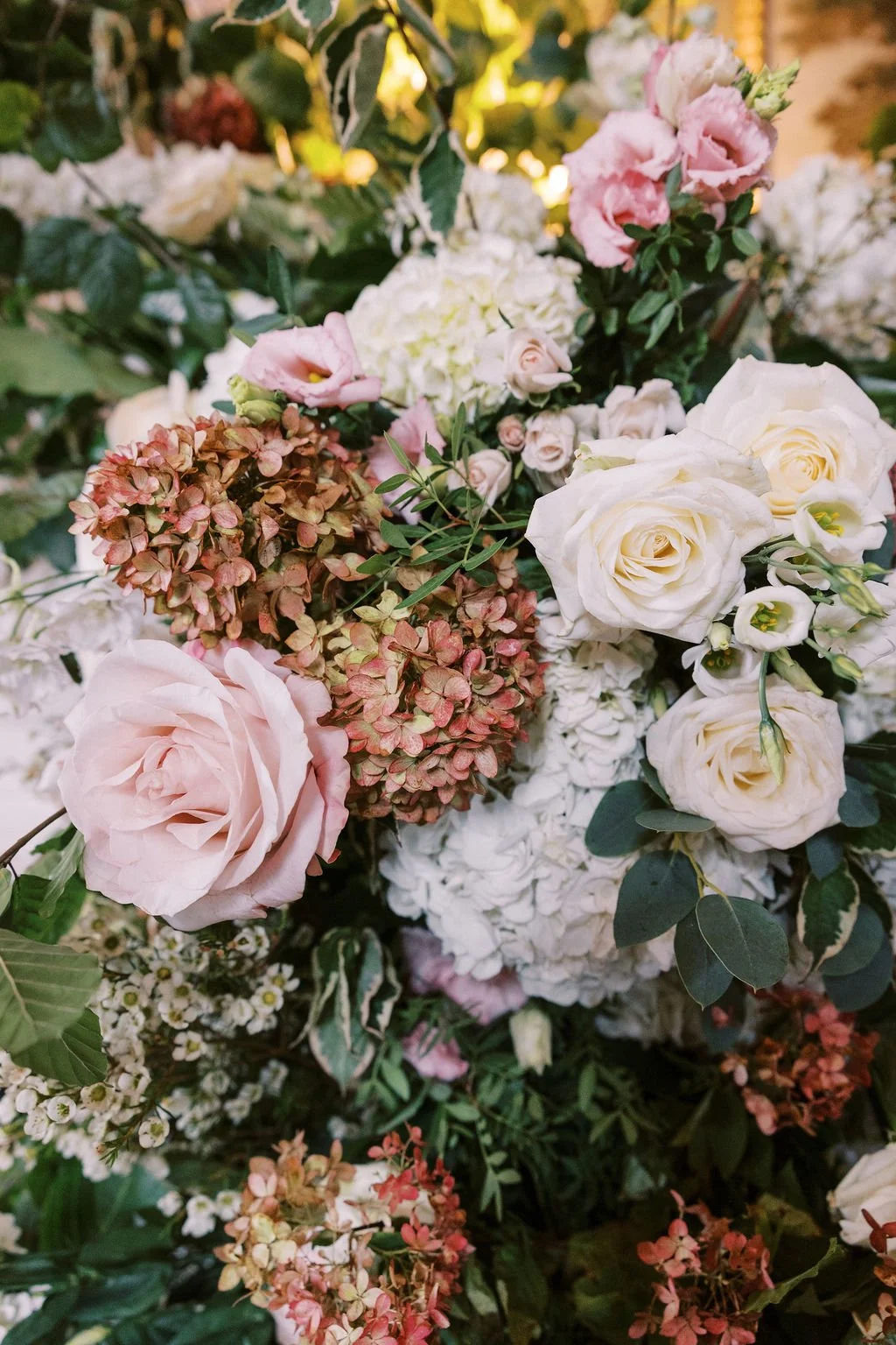 Close up wedding flower arch, hydrangea, rose. Soft pink and white