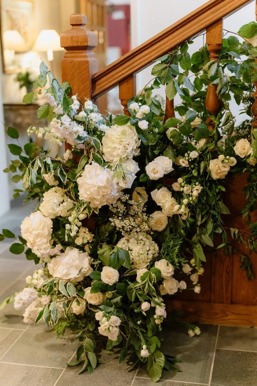Close up stairway flowers. Wedding flower decor. 