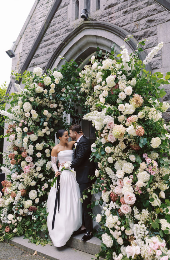 Royal Floral arch with married couple