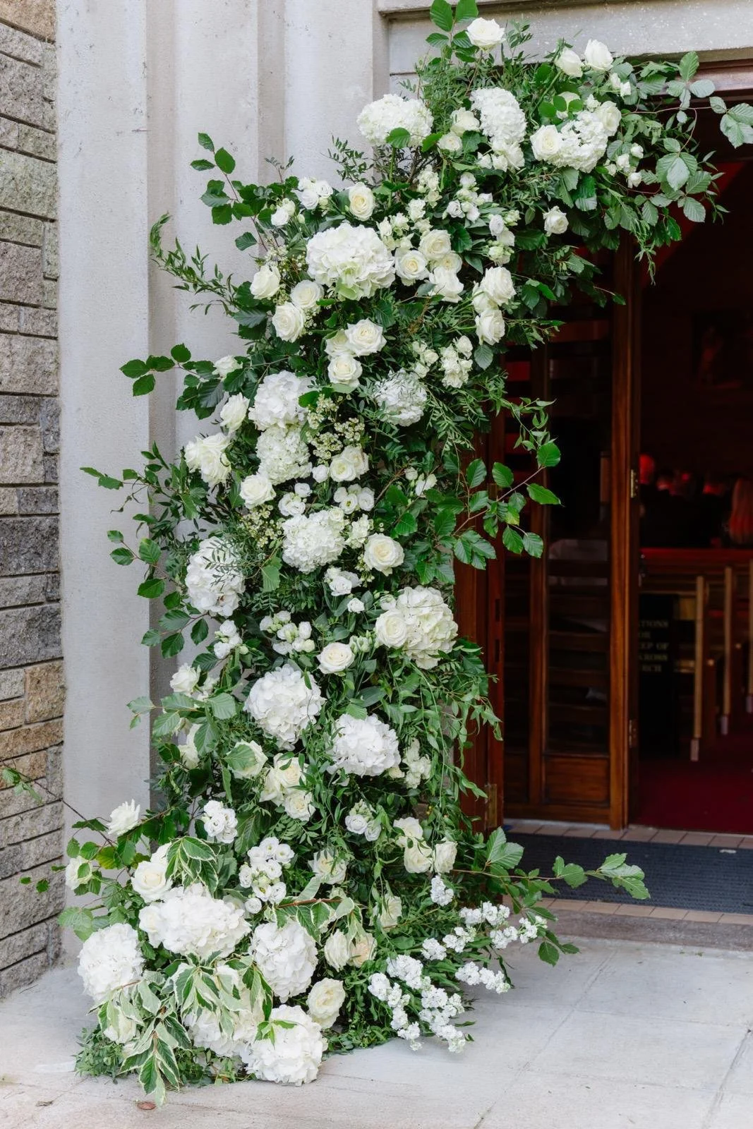 Deconstructed wedding flower arch White and green wedding flowers