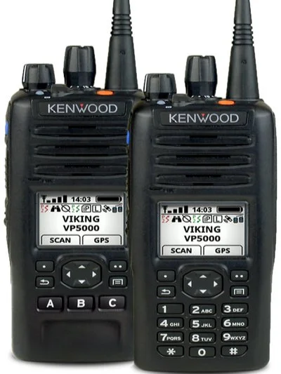 Two Kenwood Viking VP5000 portable radios with screens displaying options for scan and GPS, with antennas attached.