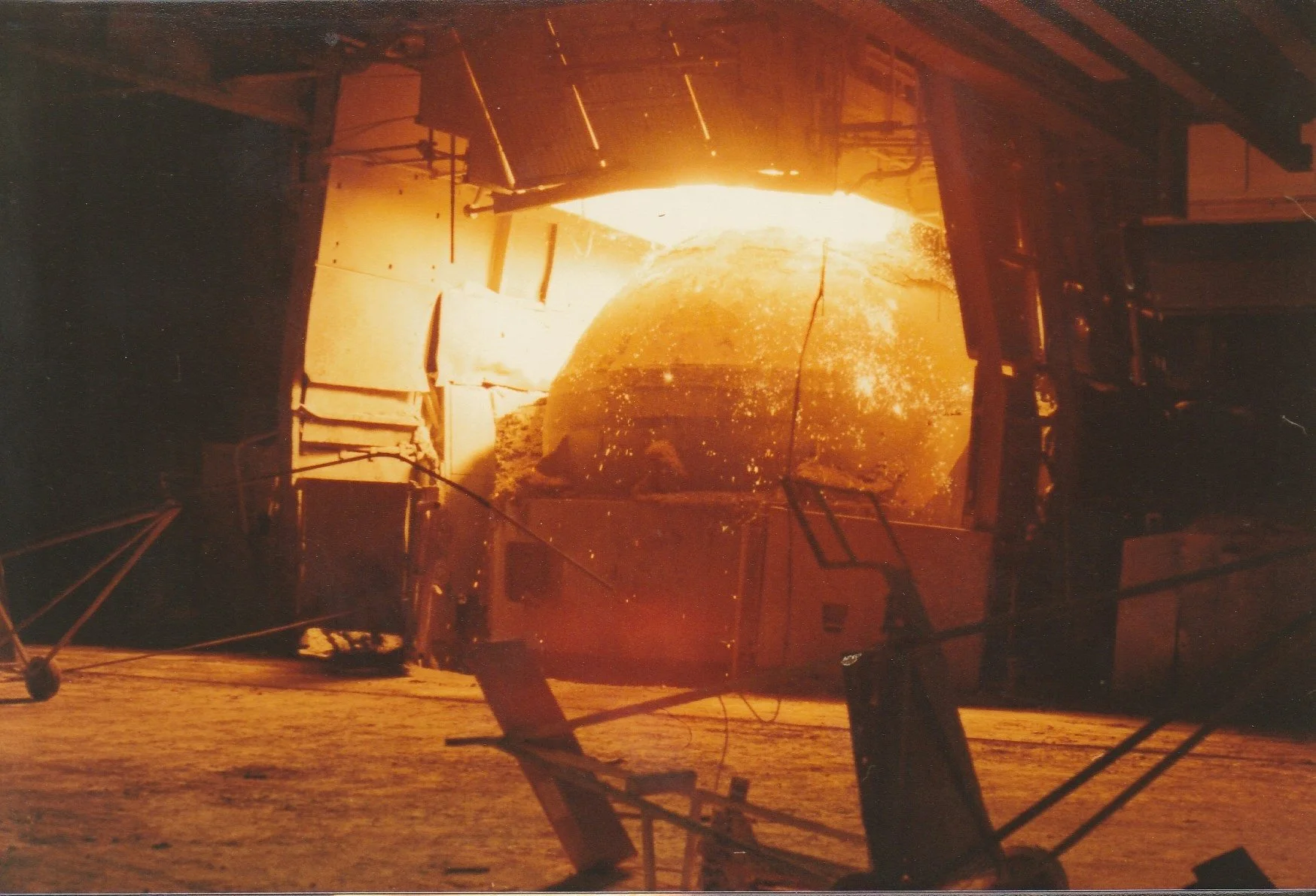 An oxygen steelmaking plant furnace in operation