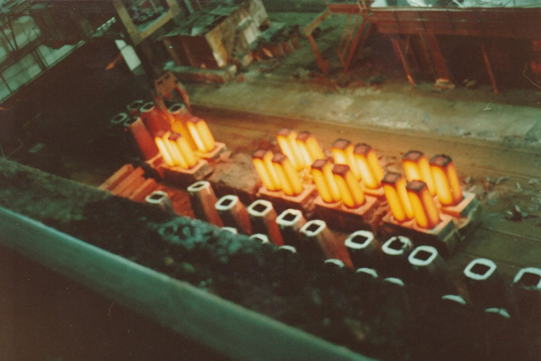 Hot steel molded into ingots